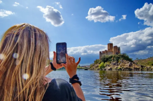Taking a photo from the Almourol Castele during the boat trip